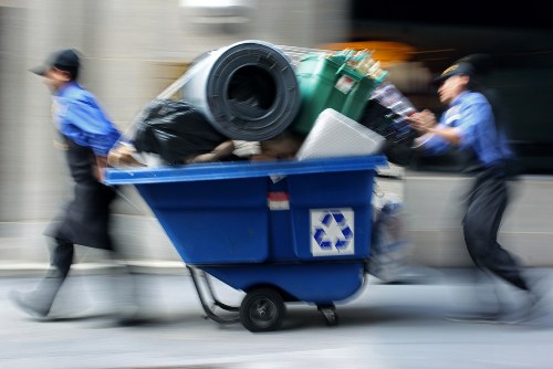 Workers safely removing building waste